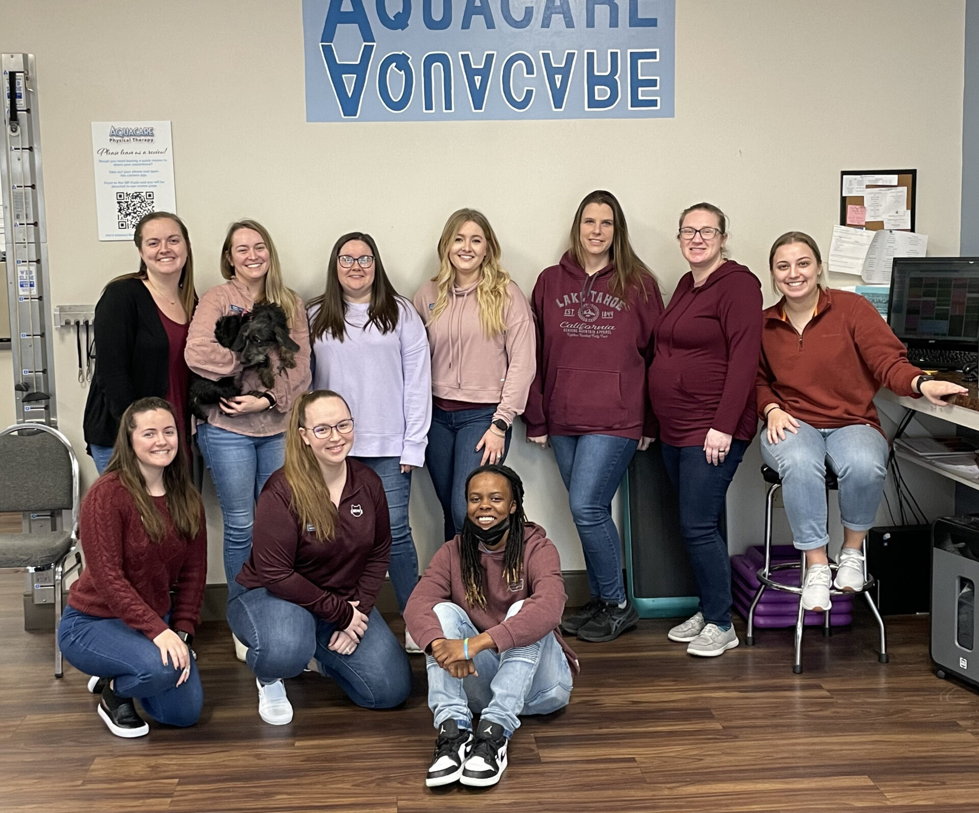 a group of women standing next to each other