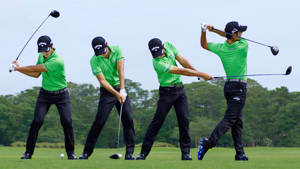 a man in green shirt swinging a golf club