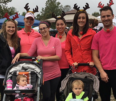 a group of people standing next to each other