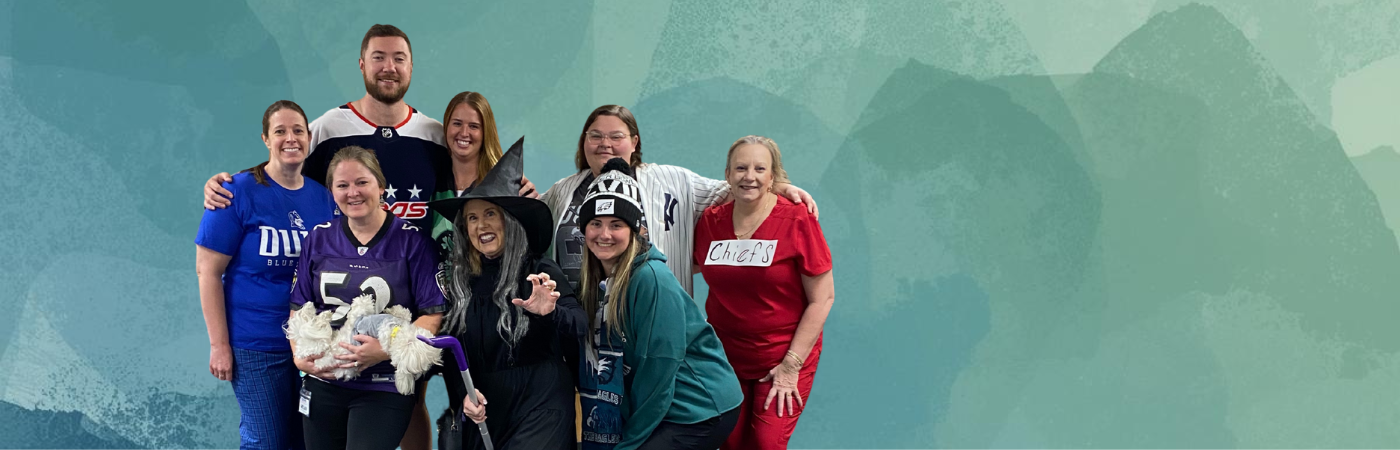 a group of people standing next to each other