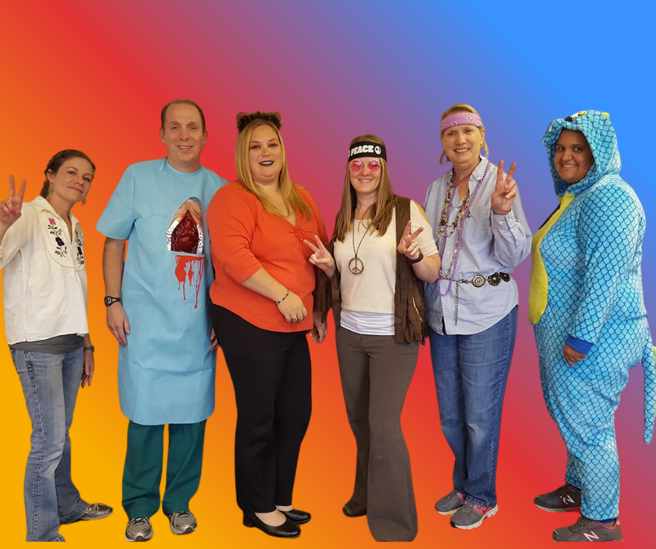 a group of people standing next to each other