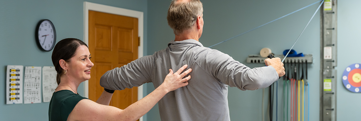 Physical Therapy for Back & Spine physical therapist working with patient back pain