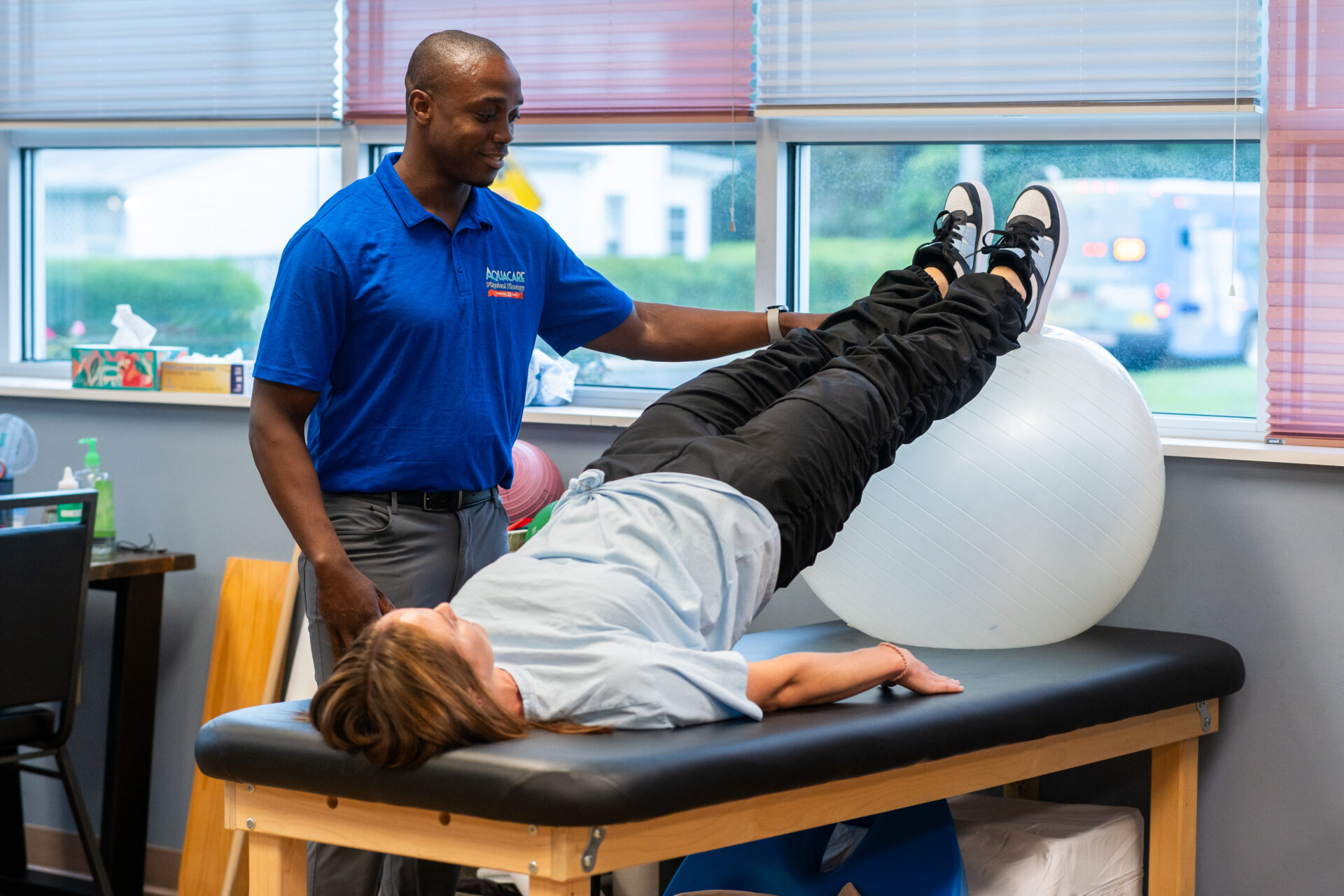 a man is doing an exercise on a ball