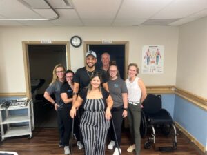 a group of people standing in a room