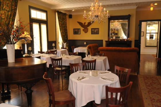 Image of Piano and Tables in the Drummer's Cafe Atlantic Hotel
