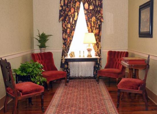 Image of Seating Area with Red Velvet Chairs Atlantic Hotel