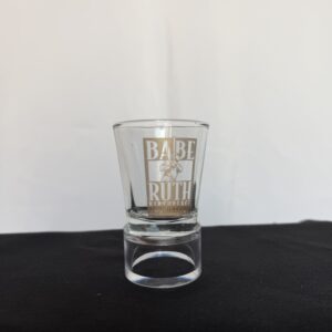 a shot glass sitting on top of a table