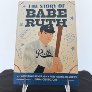 a book with a picture of a baseball player holding a bat