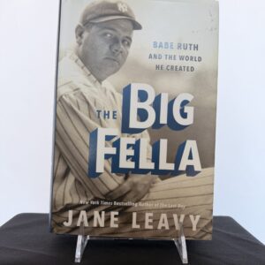 a book with a picture of a baseball player on it