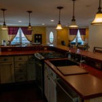 full size kitchen with refrigerator, oven/stovetop, sink and dishwasher