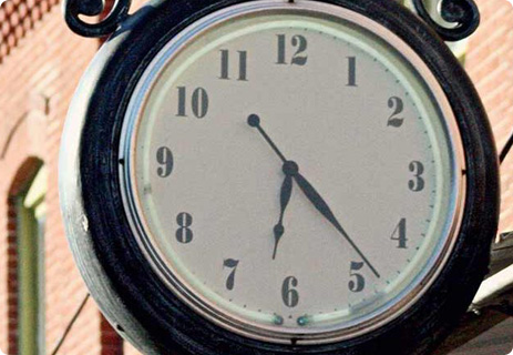 a clock on the side of a building