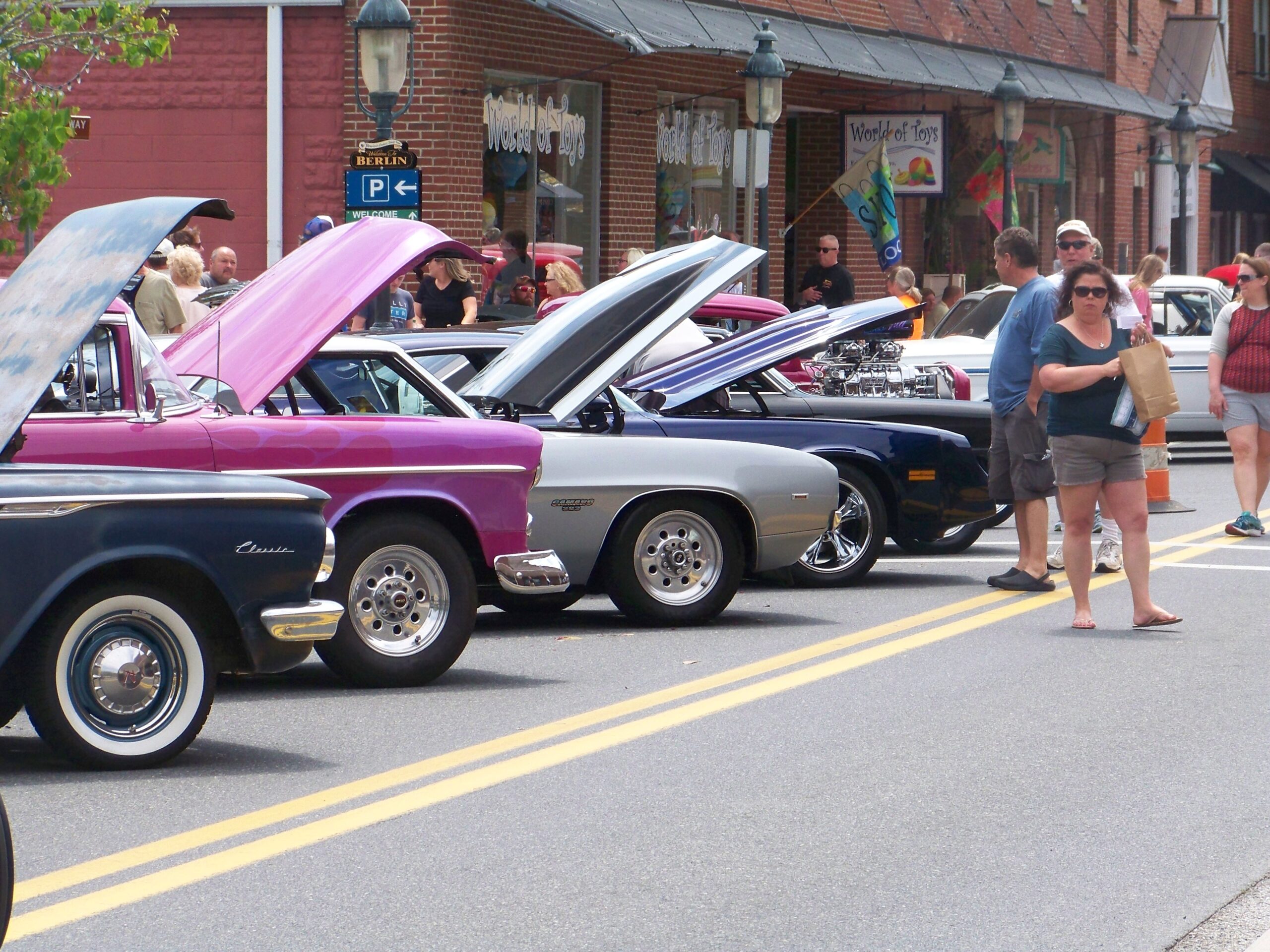 a group of cars parked on the side of a road