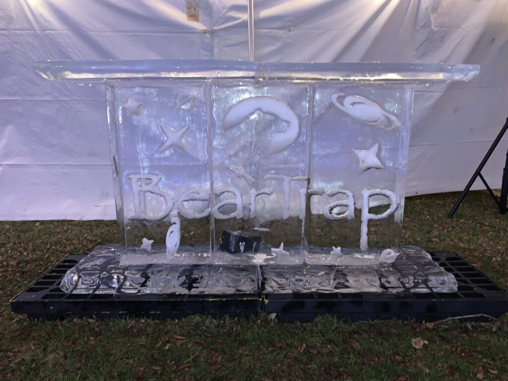 a couple of ice blocks sitting on top of a stove