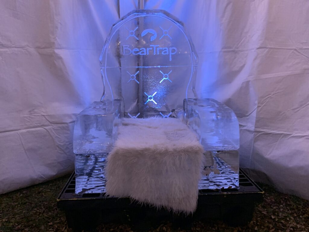 a white stool sitting on top of a table
