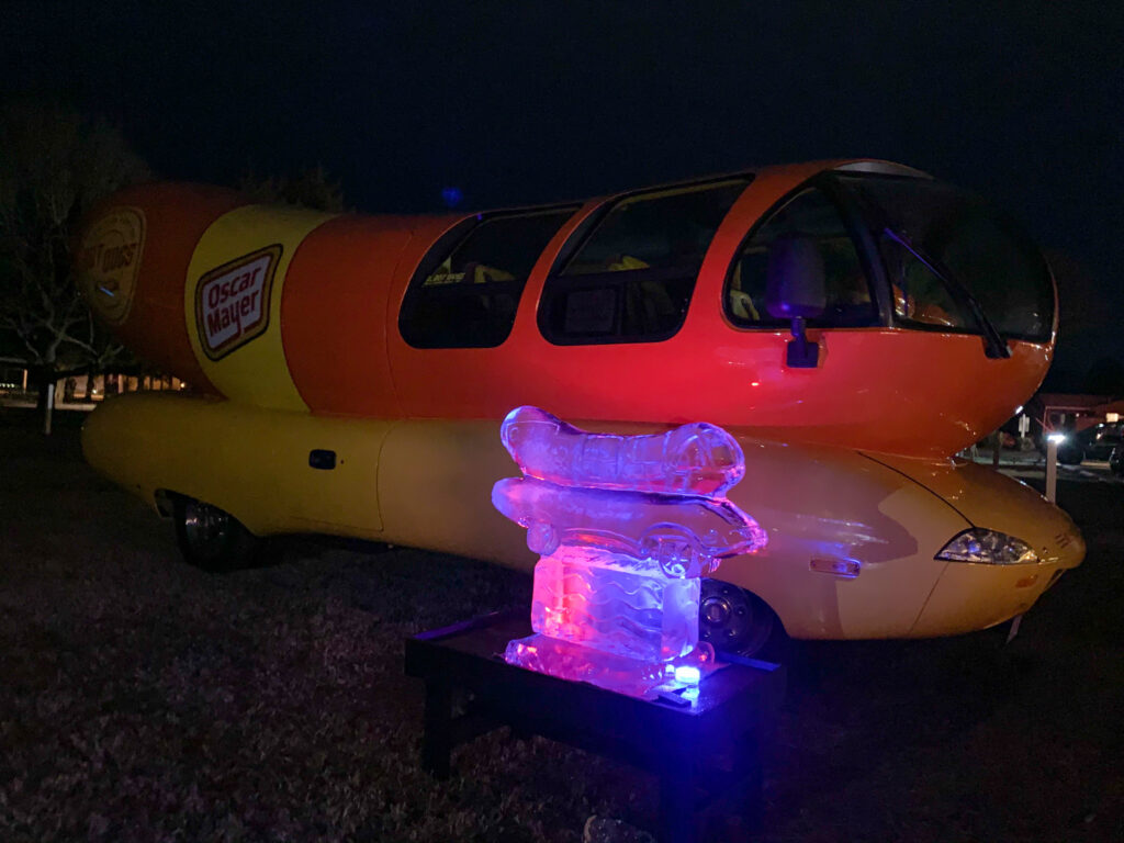 a large hot dog shaped like a car