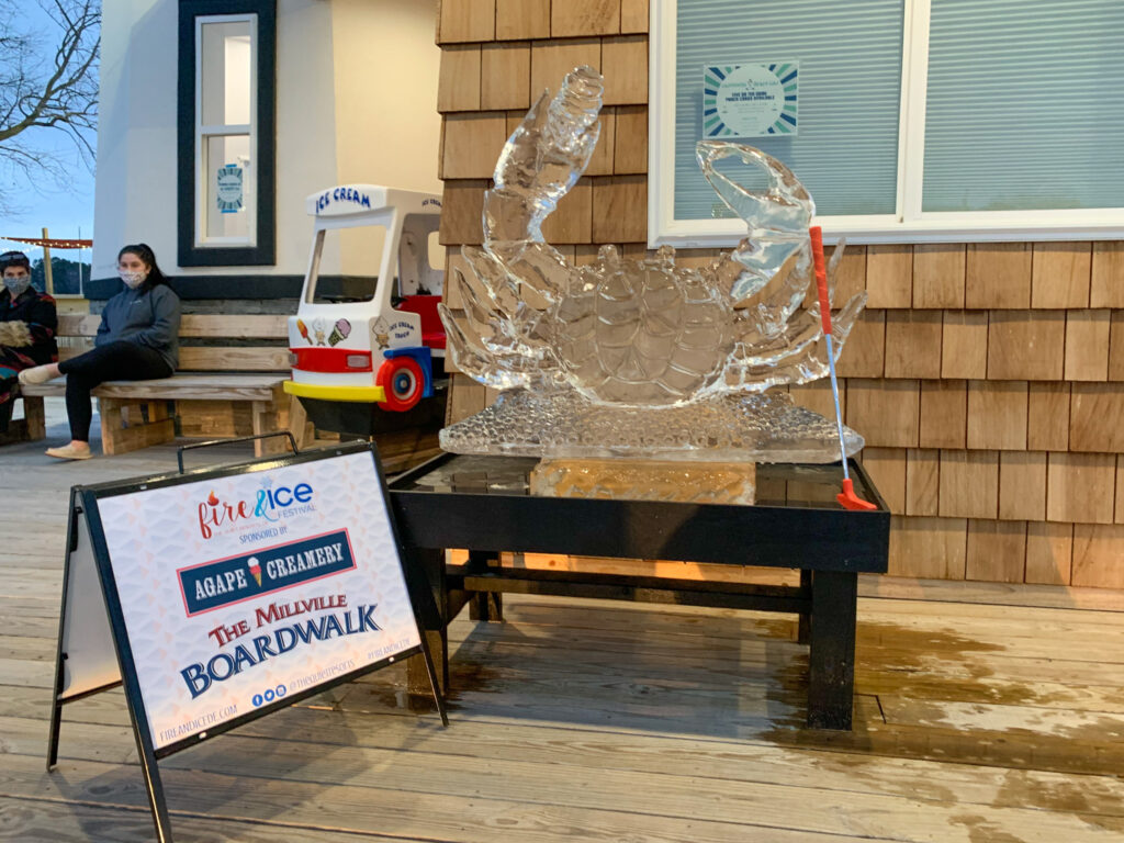 a sign that is sitting on a wooden floor