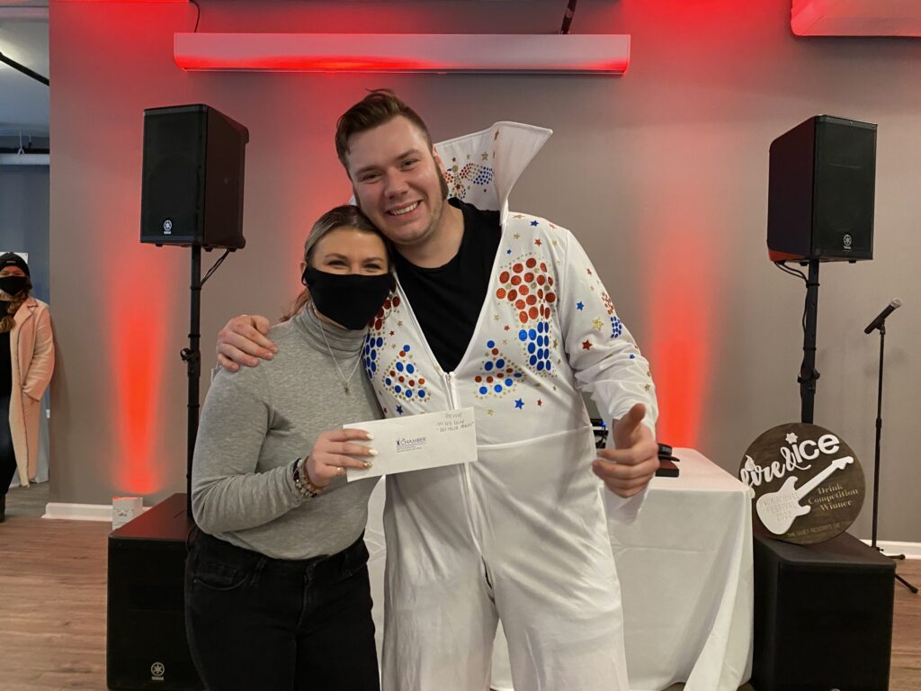 a man and a woman standing next to each other