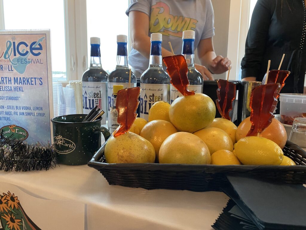 a table topped with lots of bottles of alcohol