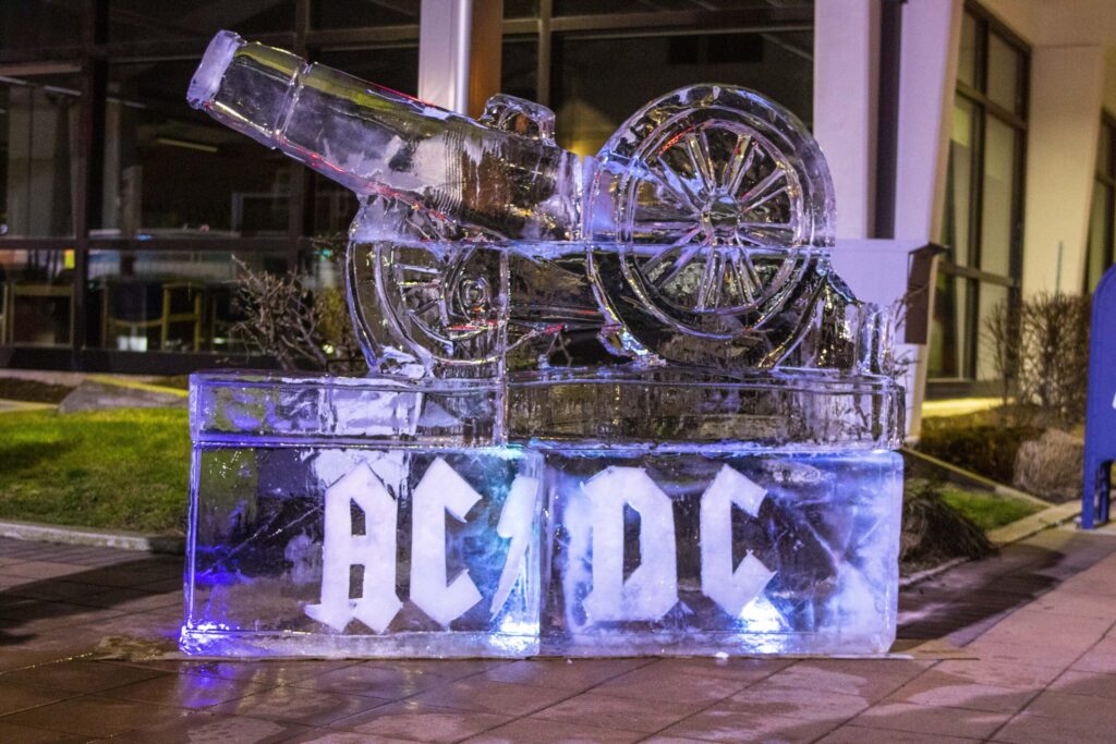 a large ice sculpture with wheels on top of it