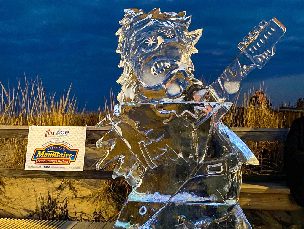 an ice sculpture of a man playing a guitar