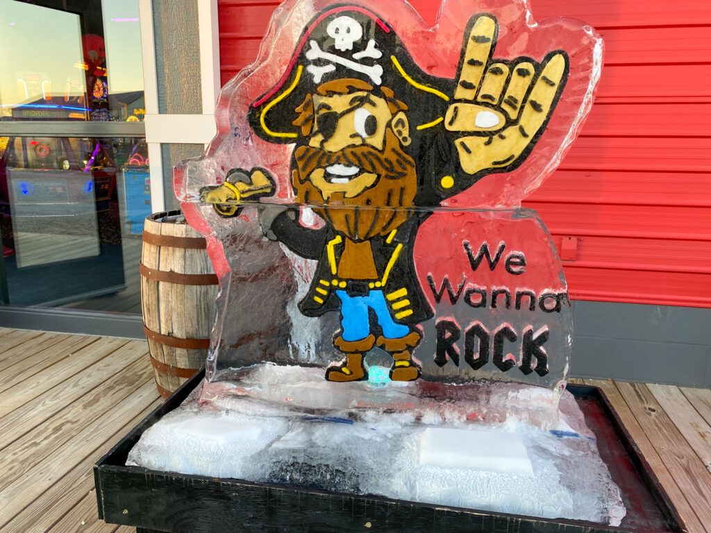 a sign that says we wanna rock in front of a store