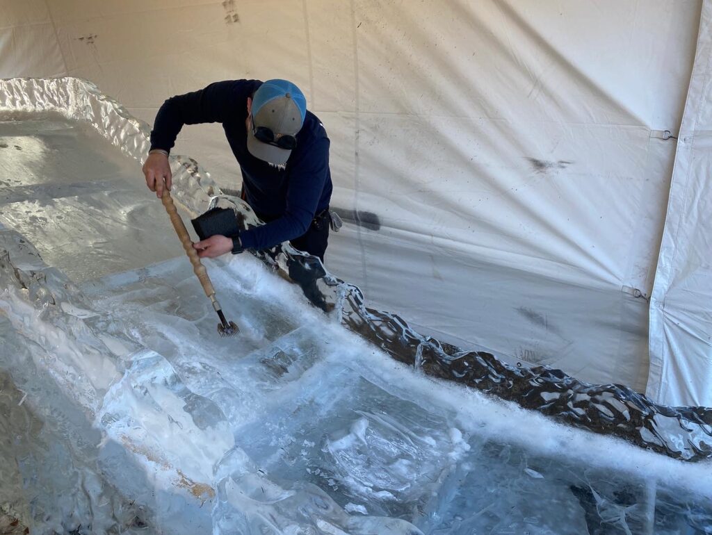 a man in a room with ice on the floor