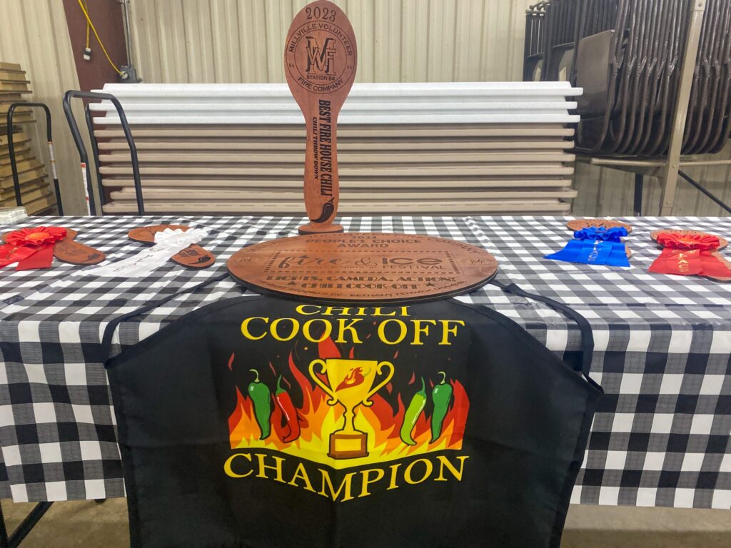 a table topped with a black and white checkered table cloth