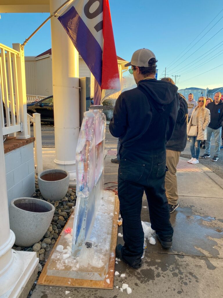 a group of people standing outside of a building