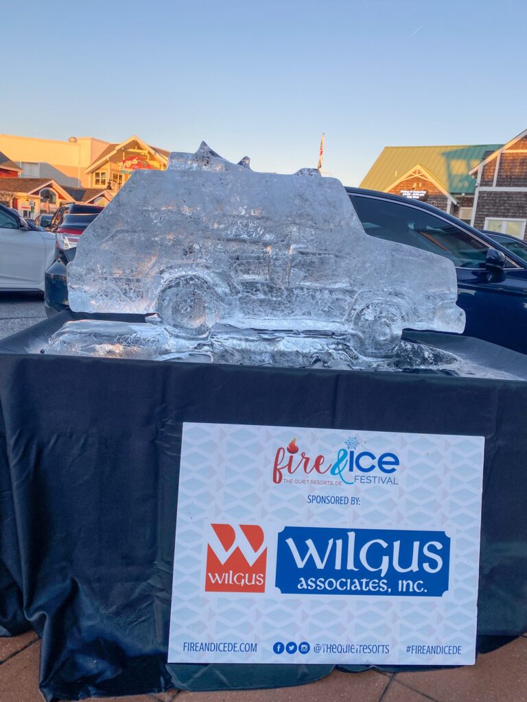 an ice sculpture of a car on a table