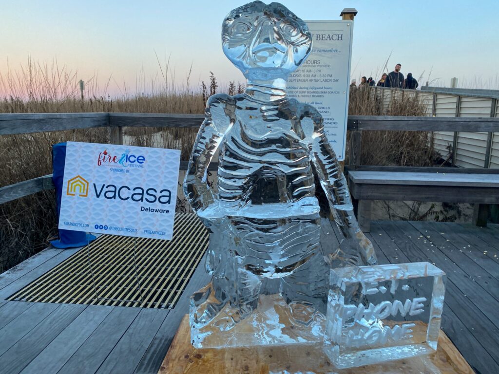 a statue of a human being made out of ice