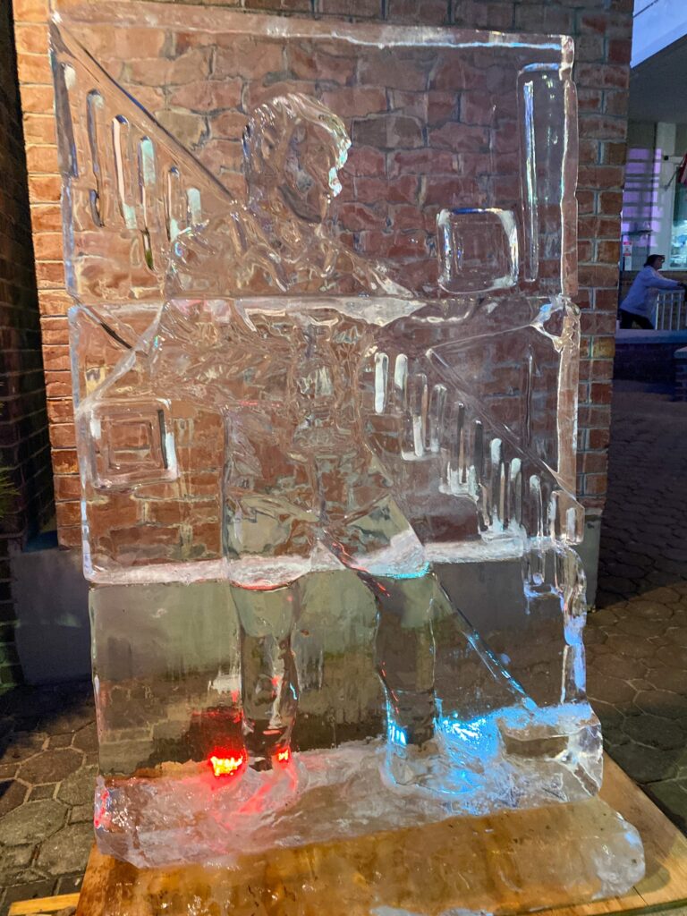 a large ice block sitting on top of a wooden table