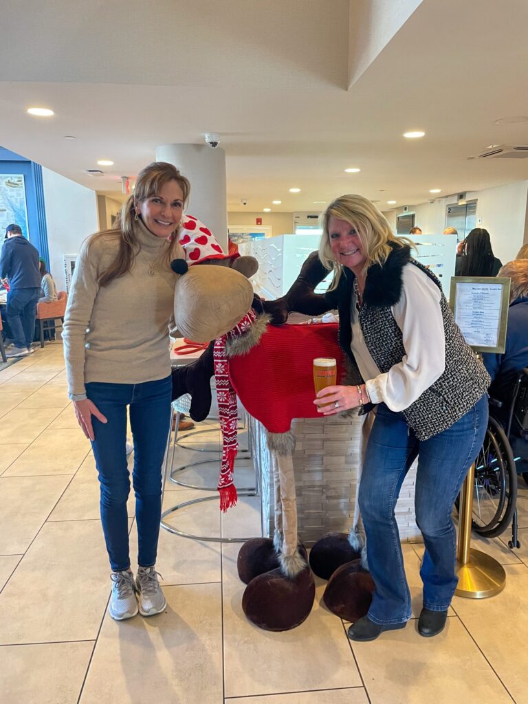 a couple of women standing next to each other