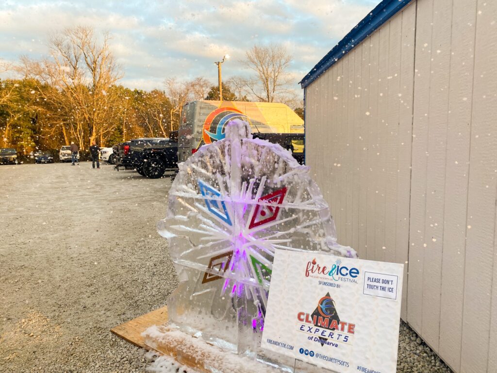 a large ice sculpture sitting next to a building