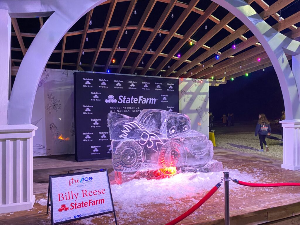 an ice sculpture of a car on display