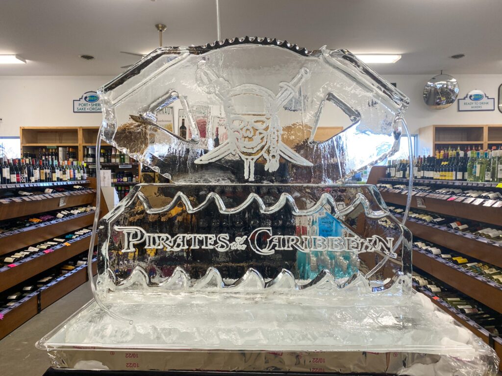 a large ice sculpture of a pirate's ship in a store