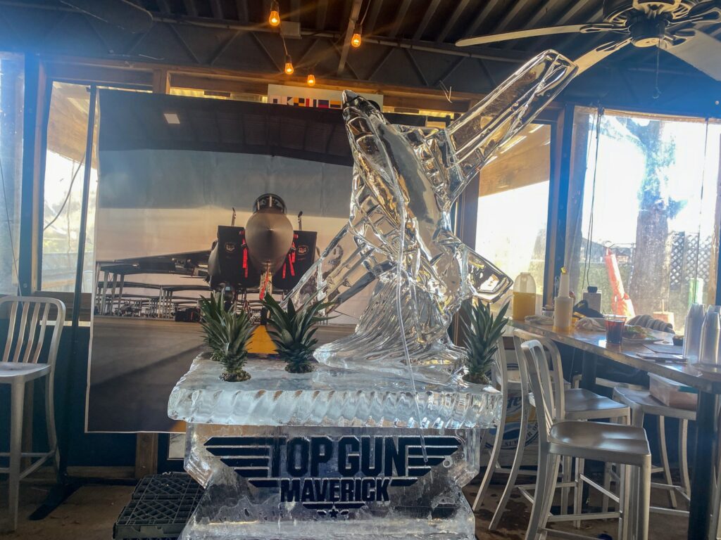 a large ice sculpture in the middle of a restaurant