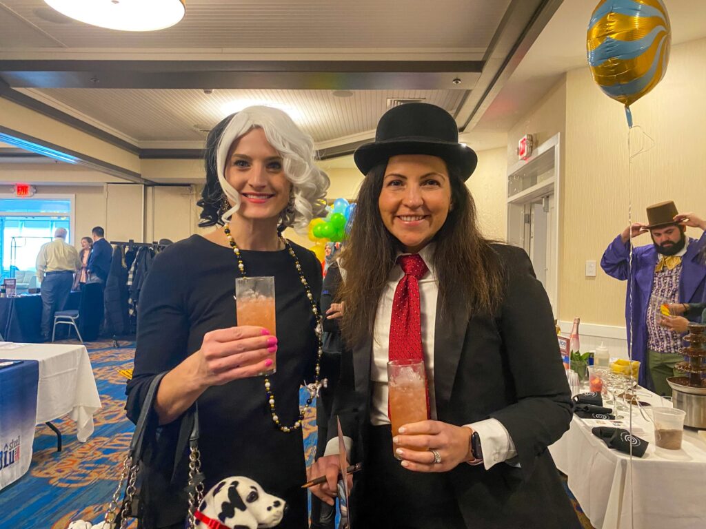 a couple of women standing next to each other