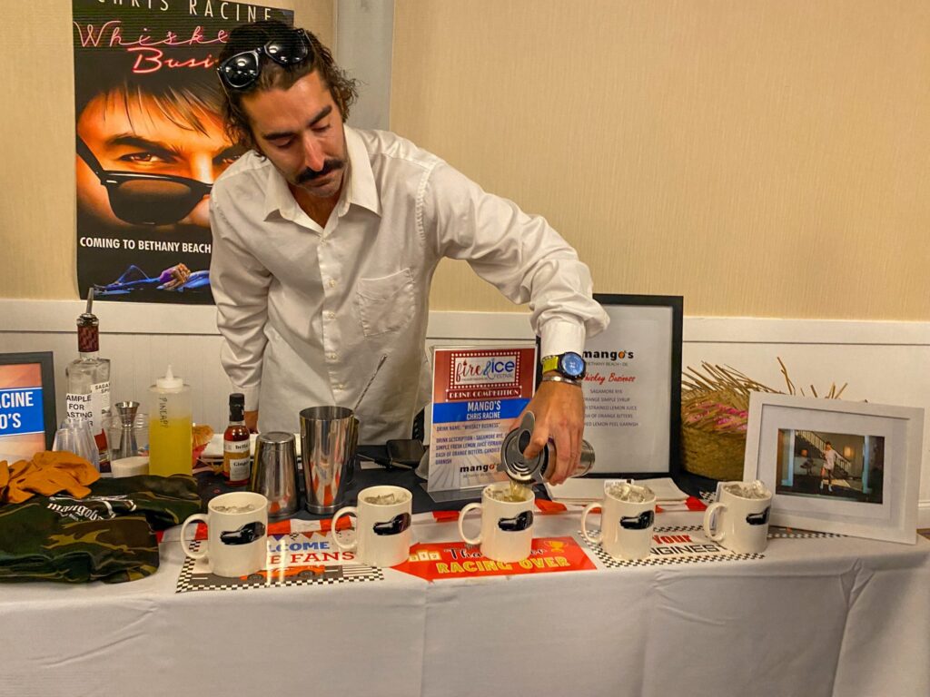 a man in a white shirt is at a table