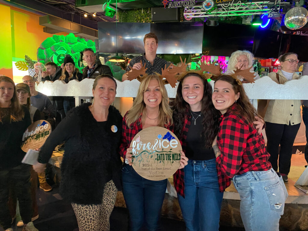 a group of women standing next to each other