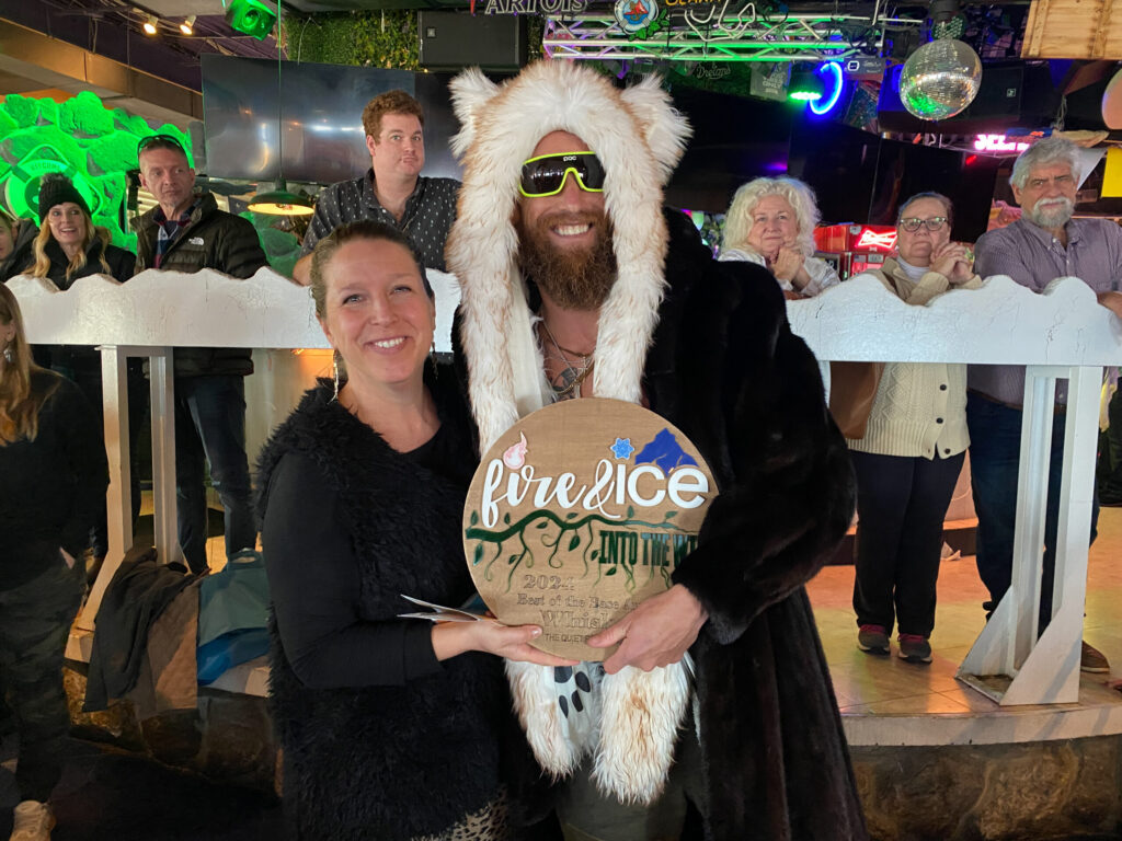 a man and a woman standing next to each other