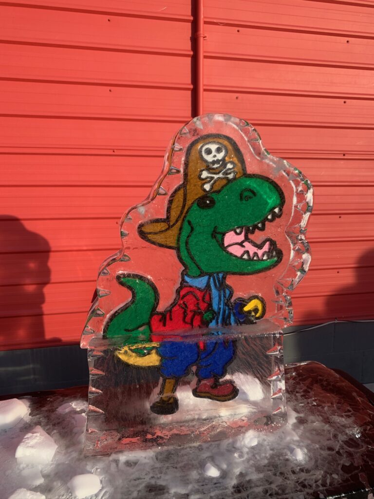 an ice sculpture of a dinosaur wearing a pirate hat