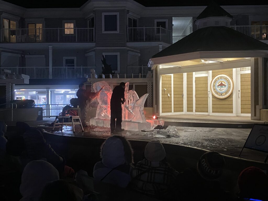 a group of people standing on top of a stage