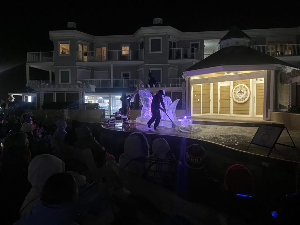 a group of people standing on top of a stage