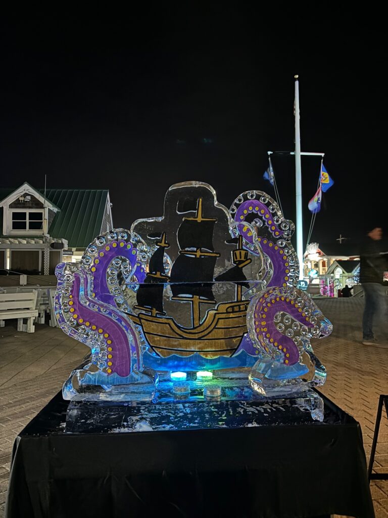 a table with a lit up boat on it