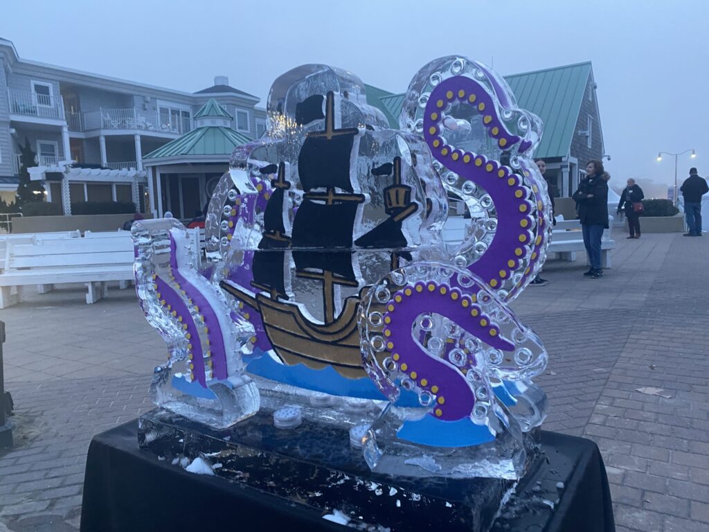 a large ice sculpture of a boat on a table