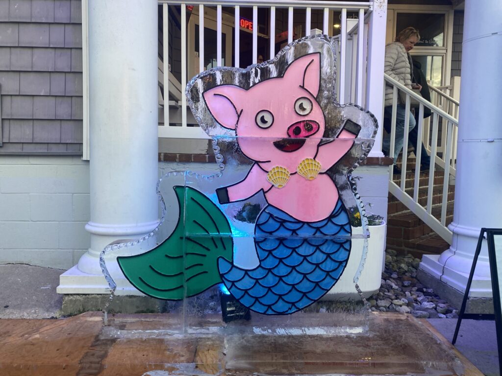 a pig that is on the side of a building