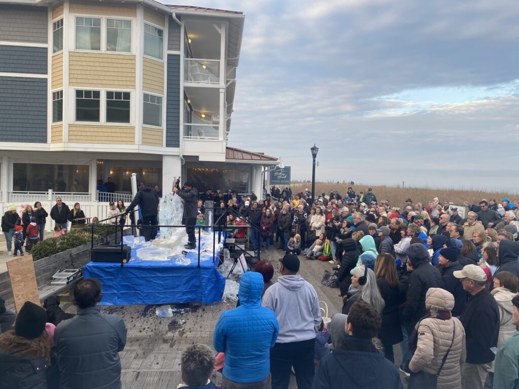 a large group of people standing in front of a building