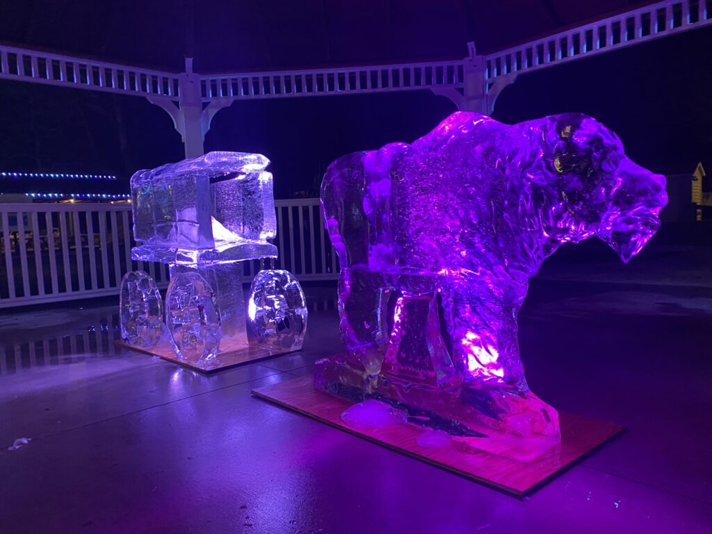 two ice sculptures of a bear and a bear cub
