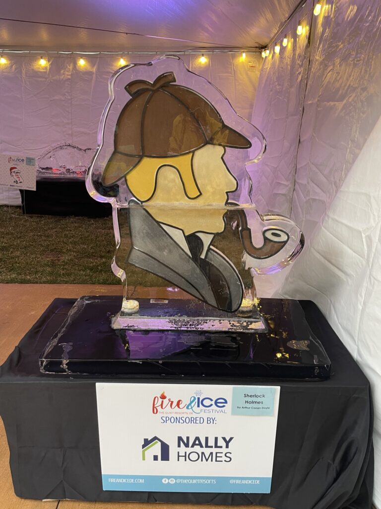 a statue of a man in a suit and tie