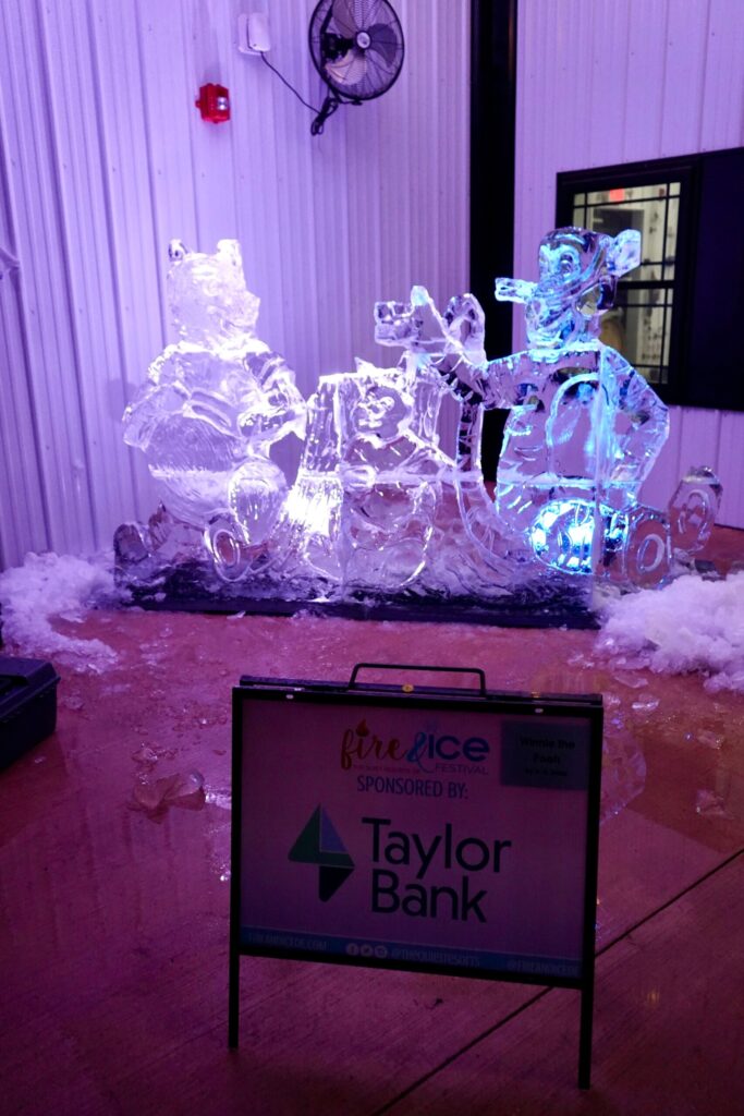 an ice sculpture of a man on a motorcycle
